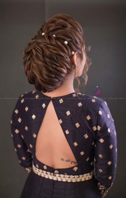 Top Bridal Hairstyles for Glamorous Look on Your Special Day - SetMyWed Makeup Artist Photography, Hair Bun Design, Lipstick Earrings, Heart Hairstyle, Whimsical Hair, Backless Blouse Designs, New Saree Blouse Designs, Twisted Heart, Artist Photography