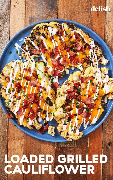 This Loaded Grilled Cauliflower Is A Summertime ClassicDelish Cauliflower Recipes Grilled, Loaded Cauliflower Steaks, Cauliflower On The Grill, Keto Grill Recipes, Cauliflower Steak Recipes, Cheesy Cauliflower Steaks, Grilled Cauliflower Steak, Grilled Cauliflower Steaks, Cauliflower Grilled