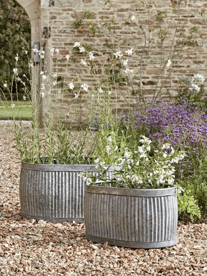 Garden Trough Planters, Large Outdoor Metal & Rattan Planters & Plant Pots UK Zinc Planters, Rattan Planters, Trough Planters, Pots And Planters, Patio Planters, Classic Outdoor, Metal Planters, Seasonal Flowers, Outdoor Planters