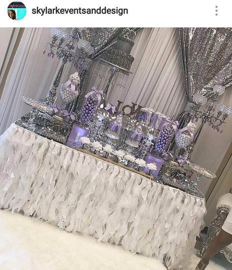 Lavender, silver, and white Bridal shower dessert table and Decor Silver Desserts, Silver Dessert Table, Birthday Decorations Silver, Spring Bridal Shower Favors, Purple Quinceanera Theme, Bridal Shower Dessert Table, Players Ball, Senior Table, Bridal Shower Dessert