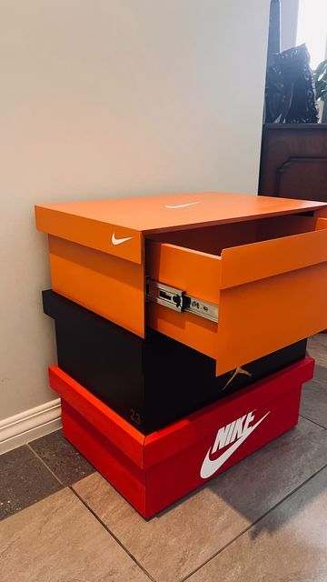 Bespoke Wood Creations on Instagram: "Had fun building and designing this custom Nike bedside cabinet. Featuring three drawers, mitred drawer fronts, and soft close runners. Have had a lot of interest in this cabinet. Thinking about making only a couple more, as one off bespoke pieces. If you wanna have a crack at building one, there will be plans available soon. Have a great Christmas, Cheer Alex #sneakerheads #customfuniture #bespoke #nike #michaeljordan #nikesoccer #woodworker #woodorganizer #solfclose #mitreddrawerfronts #shoestyle #shoeporn #shoes #shoestorage" Men Shoe Storage Ideas, Sneaker Room Decor, Nike Dresser, Sneaker Head Room Ideas Boy, Nike Bedroom Ideas, Nike Shoe Box Storage, Nike Decor, Sneakerhead Bedroom, Chest Of Drawers Decor