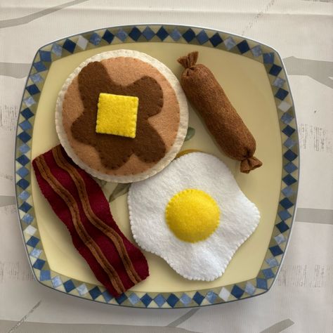 A Delightful Pretend Felt Toys For Kids Or Home Decorations For All Ages. This Play Set Is A Perfect Gift For The Child In Your Life. Felt Food Encourages Imaginary Play For Young Children. Enjoy Watching Your Little One Prepare Their Own Delicious Breakfast! What You Get For This Listing. Breakfast For One : Total Of 4 Pieces Includes: 1 Pancake , 1 Bacon , 1 Egg , 1 Sausage Pancakes Include Syrup And Butter Already Sewn To The Pancake. Measurements: Pancake : 4.1 Inches X 4.1 Inches Egg: Withi Felt Play Kitchen Accessories, Felt Mcdonalds Food, Felt Fake Food, Felt Food For Play Kitchen, Homemade Felt Toys, Fabric Play Food, Easy Felt Toys Diy, Felt Toys For Kids, Felt Play Food Diy