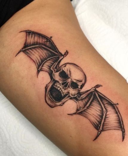 31 Best Avenged Sevenfold Fan Tattoos - NSF - Music Magazine Deathbat Tattoo Avenged Sevenfold, Metal Music Tattoo Ideas, Avenge Sevenfold Tattoo, Avenged Sevenfold Tattoo Ideas, Metal Head Tattoos, Emo Tattoos For Guys, Metal Music Tattoo, Metal Band Tattoos, Metal Tattoo Ideas