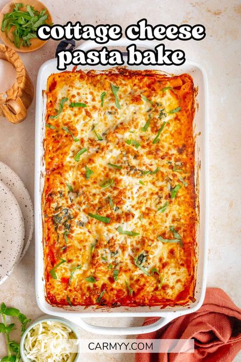 Made with only a handful of ingredients, this super simple cottage cheese pasta bake is a cheesy, delicious casserole that the whole family will love. Loaded with tender pasta, cottage cheese, marinara sauce, spinach, basil, and garlic, then topped with melted mozzarella, this pasta casserole is sure to have everyone reaching for seconds. Loaded Baked Spaghetti With Ricotta, Baked Rigatoni With Cottage Cheese, Spaghetti Casserole With Cottage Cheese, Spaghetti Sauce With Cottage Cheese, Baked Ziti With Ground Beef And Cottage Cheese, How To Make Pasta Bake, Baked Pasta Cottage Cheese, Cottage Cheese Spaghetti Bake, Spaghetti Pie With Cottage Cheese