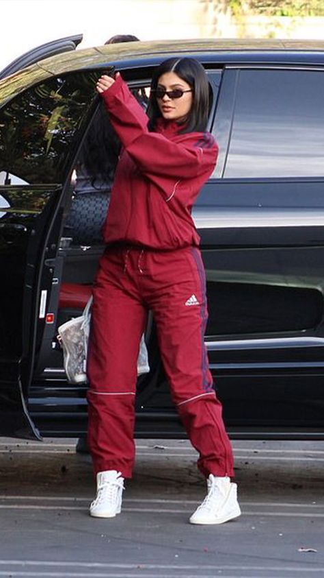 Track suits - These trends are all over social media now, but we'll definitely regret wearing them a few years down the line. Red Tracksuit Outfit Women, Nike Track Suits For Women, Kylie Cars, Adidas Tracksuit Women Outfit, Tracksuit Outfit Women Street Styles, Tracksuit Outfit Women, Track Suit Outfit, Ropa Kylie Jenner, Track Suits Women