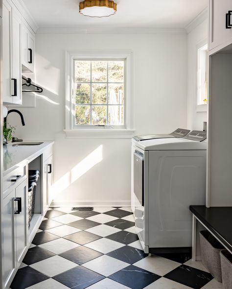 Laundry day, but make it glamorous! 🧺✨ Check out this laundry room/mudroom combo. It was part of our latest renovations projects and features black and white checkered floors, sleek cabinetry, and plenty of storage to keep everything in its place. 💫 . . . . . . #LaundryRoomGoals #MudroomInspiration #LuxuryLiving #HomeOrganization #BlackAndWhiteDesign #CentralNJBuilders #NorthernNJConstruction #JerseyGeneralContractors #HomeImprovement #CustomDesign #DreamHome #NJBuilders #LuxuryBuilders #Hom... Black And White Checkered Laundry Room, Checkerboard Laundry Room, Laundry Room Ideas Checkered Floors, Grey Floor Laundry Room, Black And White Tile Floor Laundry Room, Black And White Tiles Laundry Room, Checkerboard Tile Floor Laundry Room, Black And White Floors Laundry Room, Checkered Tile Mudroom