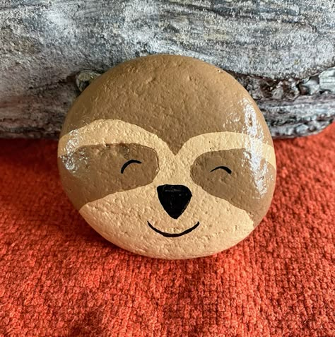 Sloth Rock Painting Ideas, Rock Painting Mushroom Ideas, Rock Painting Ideas Small Rocks, Rick Paintings Easy, Sloth Painted Rocks, Simple Rock Designs, Monkey Rock Painting, Easy Rock Art Ideas, Sloth Rock Painting