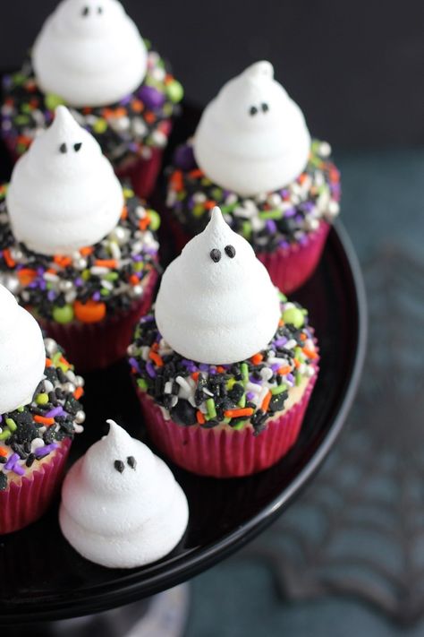 Ghost Meringue Cupcakes - Baking with Blondie Ghost Meringue, Ghost Meringues, Baking With Blondie, Meringue Cupcakes, Ghost Cupcakes, Holiday Cupcakes, Halloween Baking, Halloween Desserts, Halloween Cupcakes