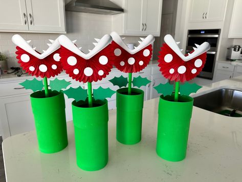 Diy Mario Centerpieces, How To Make Super Mario Decorations, Mario Flower Diy, Goomba Decoration, Pirana Plant Mario, Super Mario Birthday Party Centerpiece, Mario Kart Gender Reveal, Diy Mario Tube, Mario Warp Pipe Diy