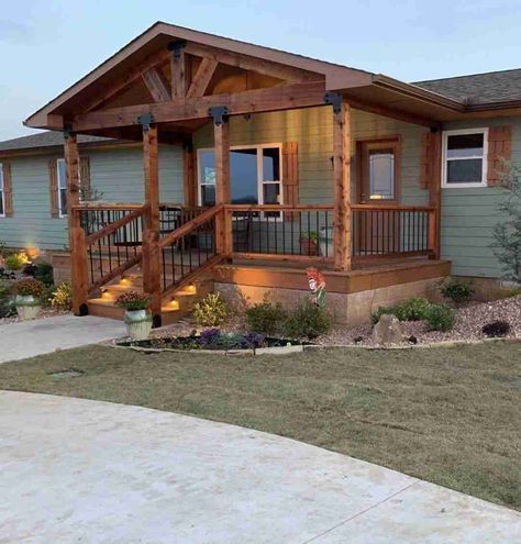 5 Easy Ways to Add Curb Appeal To Your Manufactured Home Adding Porch To Mobile Home, Remodeled Manufactured Homes, Upgrade Mobile Home, Manufactured Home Remodel Exterior, Mobile Home Decks And Porches, Manufactured Home Porch Ideas, Mobile Home Landscaping Ideas, Manufactured Home Exterior, White Oval Dining Table