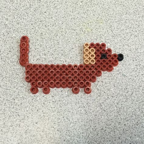 Made this based on my Shelby!  Dachshund Hama beads Dachshund Perler Bead Patterns, Puppy Perler Beads, Dog Melty Beads, Fuse Bead Animals, Simple Perler Bead Patterns Ideas, Hama Beads Patterns Animals, Cute Fuse Beads Ideas, Perler Bead Animals, Cute Hama Bead Ideas