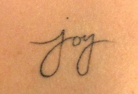 Minimal tiny joy tattoo Joy Cursive Tattoo, Joyful Tattoo Ideas, Joy Symbol Tattoo, Joy Tattoo Ideas Symbols, Joy Tattoo Ideas, Joy Symbol, Lil Tattoos, Joy Tattoo, Tiny Tats