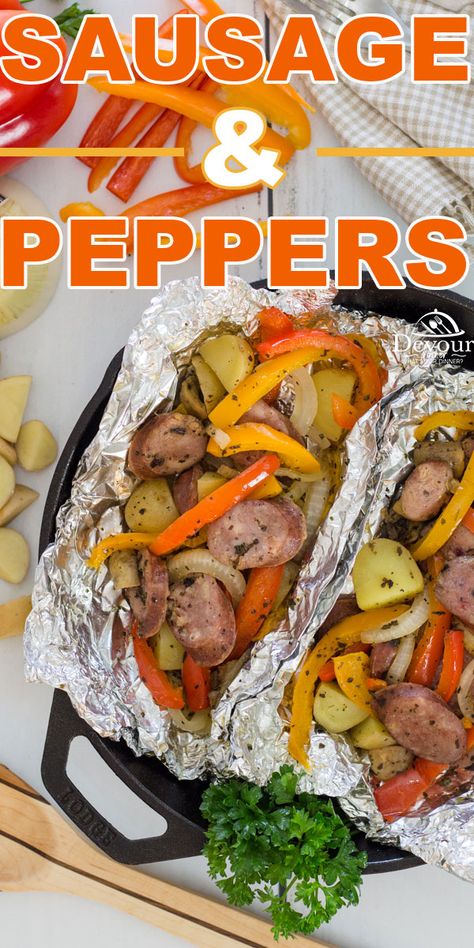 Family Friendly Camping Tin Foil Dinner Sausage and Peppers. Let the natural flavors shine through in this simple dinner recipe that's great. Roast in oven, Grill on BBQ, or place over Charcoal, you won't go wrong with this easy to make Dinner Recipe the family will love. #devourdinner #devourpower #familyrecipe #easyrecipe #iammartha #bonappetitmag #thekitchn #recipeoftheday #americastestkitchen #foodgawker #bareaders #sausageandpeppers #tinfoilmeal #tinfoildinner #roastedsausageandpeppers Trisha's Southern Kitchen, Andouille Sausage Recipes, Tin Foil Dinners, Trisha Yearwood Recipes, Sausage Peppers And Onions, Foil Packet Dinners, Foil Dinners, Foil Packet Meals, Trisha Yearwood