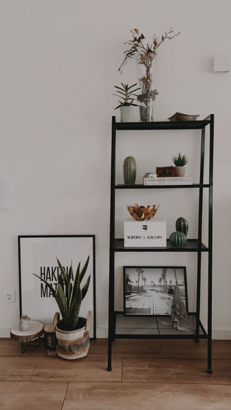 Black White And Green Home Aesthetic, Dark Neutral Apartment Decor, Black And White Shelf Styling, Green And Grey Home Aesthetic, Black White Green Brown Bedroom, Black White Cream Green Bedroom, Black White Green Apartment, Black White Green Brown Interior, Green Black Apartment