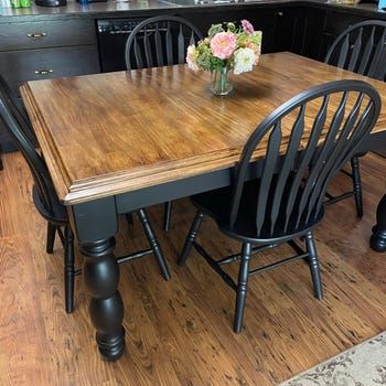 Dark Stain Table With Black Chairs, Black Brown Dining Table, Dining Room Table Two Tone, Painted Black Kitchen Table, Stained Table With Black Chairs, Refinishing Kitchen Island, Kitchen Table Makeover Farmhouse, Redoing Oak Table And Chairs, Farmhouse Table Black Legs Wood Top