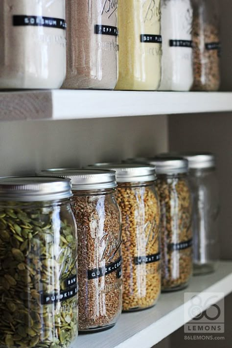 Open Pantry shelves with canning jars   86lemons.com Open Pantry Shelves, Open Pantry, Mason Jar Storage, Cocina Diy, Pantry Organisation, Rental Kitchen, Hemma Diy, Jar Storage, Wine Bottle Diy