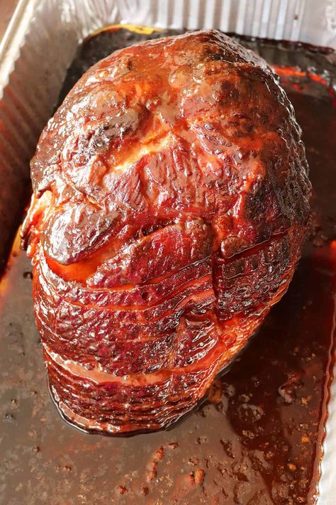 A double-smoked ham recipe cooked with a dry rub and honey glaze is a delicious and flavorful dish that combines the rich smokiness of the ham with savory and sweet flavors from the rub and glaze. How To Cook A Smoked Ham, Ham On Smoker Grill, Honey Smoked Ham, Double Smoked Spiral Ham, Smoked Spiral Ham Recipe, Best Smoked Ham Recipe, Smoked Shredded Ham, Crockpot Smoked Ham, Twice Smoked Ham