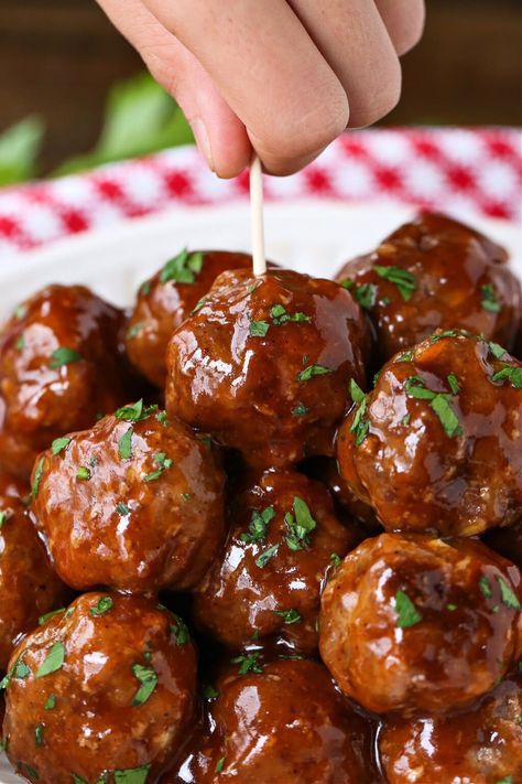 BBQ Party Meatballs are one of our favorite party appetizers! Homemade meatballs that are oven baked and tossed in a sweet and spicy sauce. Bbq Meatball Sliders, Meatball Skewers Appetizers, Homemade Bbq Meatballs, Easy Bbq Meatballs, Barbecue Meatball Recipes, Meatballs Sauce Recipe, Oven Meatballs, Sweet Meatballs, Bbq Meatball Recipe