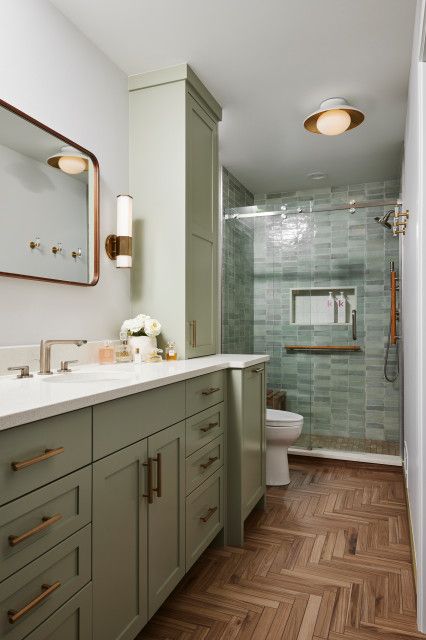 Bathroom of the Week: Warm Spa Feeling in 60 Square Feet Green Bathroom Cabinets, Green Vanity Bathroom, Double Closet Doors, Green Vanity, Shower Door Hardware, Brown Floors, Transitional Bathroom, Brown Bathroom, Vanity Bathroom