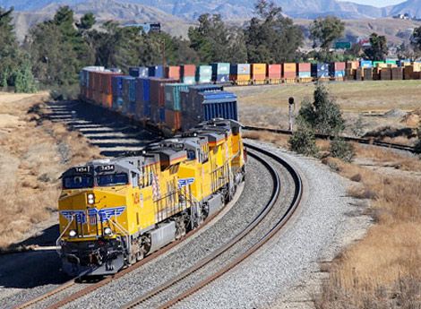 1-10-2010: *** One monster freight takes over 600 18-wheel trucks off the road ... *** Union Pacific quietly ran a record-setting "monster" freight train over its Sunset Route, from Dallas to Long Beach, using the 3.5-mile-long behemoth during a one-time test of new distributed-power configurations that may help make long trains even longer. Read more: Is Bigger Better? 'Monster' Trains vs Freight Trains - Popular Mechanics Union Pacific Train, Old Steam Train, Freight Train, Union Pacific Railroad, Cargo Services, Freight Forwarder, Train Art, All Aboard, Steam Trains