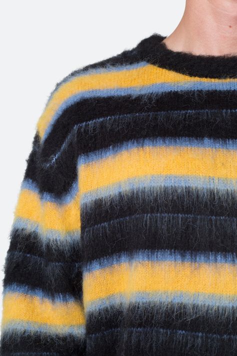 the Striped Mohair Sweater is a custom striped knit sweater that is constructed from an synthetic yarn and features a standard fit, and is finished in a brushed exterior texture. details classic fit 100% polyester model is 6’1, 140 lbs and wears a size medium Exterior Texture, Purl Knit, Layered Hoodie, Striped Knit Sweater, Knit Purl, 140 Lbs, Concept Clothing, Mohair Cardigan, Streetwear Men