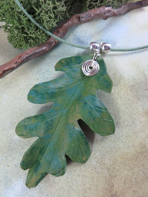 Hand made leather jewellery by TribaMythica. Tooled leather leaf and feather pendants and earrings. Faery, Pagan, Boho. Hand Made Leather, Leather Jewellery, Leather Leaf, Feather Pendant, Leaf Jewelry, Leather Projects, Tooled Leather, Leather Tooling, Leather Craft