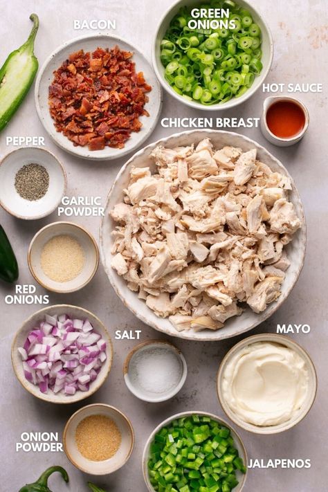 This Jalapeno Popper Chicken Salad recipe is easy to make and loaded with homemade chopped chicken, mayo, bacon, onions, and jalapenos. Serve this salad over lettuce or on top of cucumbers. Only 2 NET carbs per serving! Whole30, Keto, GF, DF and Paleo. Jalapeno Popper Chicken Salad, Chicken Mayo, Chicken Salad Sandwich Recipe, Chicken Poppers, Popper Chicken, Jalapeno Popper Chicken, Whole30 Keto, Jalapeno Chicken, Stuffed Jalapenos With Bacon