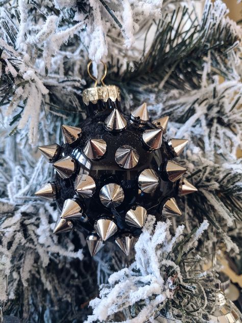 See how I create a unique black and silver spiked ornament on my You Tube Channel Rock N Roll Christmas Decorations, Black And Silver Christmas Decorations, Black Silver Christmas Tree, Black Xmas Tree, Christmas Goth, Black Christmas Tree Decorations, Black Ornaments, Black Christmas Decorations, Christmas Tree Inspo