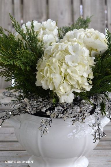 Create a 'White Christmas' or Frosty Winter flower arrangement for some welcome flower therapy for a cold December or winter day using flowers from the grocery store and some Christmas decorations. Flower Arrangement Diy, Winter Flower Arrangements, Cold December, Winter Floral Arrangements, Welcome Flowers, Elegant Wedding Flowers, White Flower Arrangements, Hydrangea Arrangements, Christmas Flower Arrangements