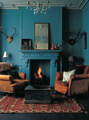 Intense deep teal walls and fireplace with earth brown and red furniture and accessories and antiques plus antlers Teal Living Rooms, Teal Walls, Room Redo, Blue Rooms, Rustic Living, Beautiful Living Rooms, Styl Retro, The Ceiling, Settee