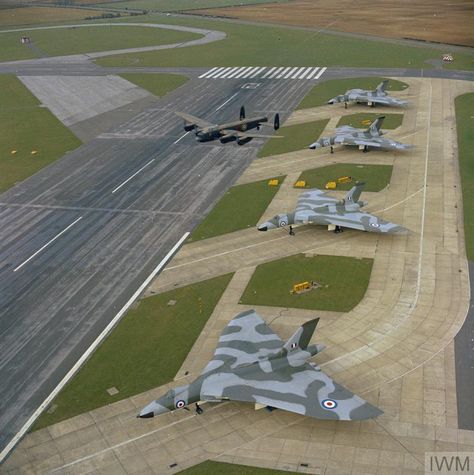 The last British Avro Lancaster in flying condition over Avro Vulcan B.2s of No 230 Operational Conversion Unit (OCU) based at RAF Finningley but on the Operational Readiness Platform at RAF Waddington, Lincolnshire. The Vulcan B2s are (front to rear) XH561, XJ782, XM656 and XJ824. The Lancaster was PA474. Avro Lancaster, Avro Vulcan, Delta Wing, Military Airplane, British Aircraft, Aircraft Photos, Navy Aircraft, British Military, Vintage Aviation