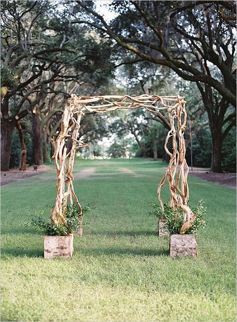 simple twisted wood wedding arch #weddingceremony #ceremonyarch #weddingchicks http://www.weddingchicks.com/2014/03/20/elegant-wedding-at-the-legare-house/ Wood Wedding Arch, Wood Wedding Arches, Forest Weddings, Garland Backdrops, Rustic Vintage Wedding, Arch Decoration Wedding, Fall Wedding Cakes, Ceremony Arch, Wood Wedding