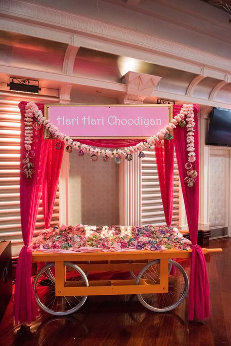 Bangle Cart at Indian Sangeet planned by Tara M Events Sangeet Favors, Mendhi Decor, Weddings Decorations Elegant Romantic, Stall Decorations, Bangle Ceremony, Mehendi Decor Ideas, Station Photo, Indian Wedding Favors, Wedding Planning Decor