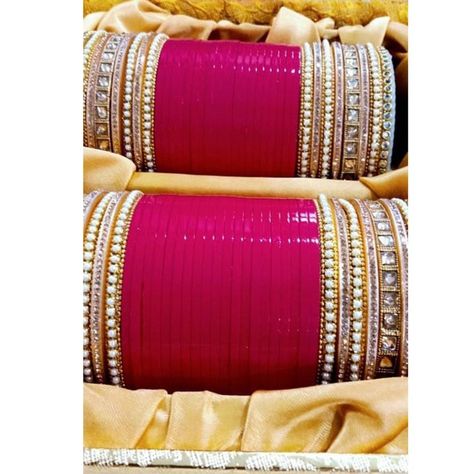 Get the perfect look for your wedding by pairing this traditional chuda with your Ethnic outfit. Color: Pink Material: Plastic Occasion: - Suitable for Wedding, however, can be wore on any festivals by you and your loved ones. The Product is made from Non Allergic Metal thus making it safe to wear The vibrant colors, the exclusive designs, the traditional touch, the artistic work makes our bangles prominent one. Care Instruction: No Direct Perfume, Deo, Water, Spray On The Jewelry. First Wear Yo Punjabi Choora, Bridal Chura, Unique Bangle, Fancy Jewellery Designs, Pink Lehenga, Thread Bangles, Bridal Jewelry Collection, Bridal Bangles, Pink Bridal