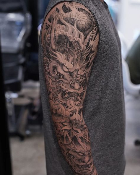 Arm Sleeve Tattoos Dragon, Full Arm Dragon Tattoo Japanese Sleeve, Dragon Tattoo Men Arm Japanese Sleeve, Fu Dog Sleeve Tattoo, Asian Dragon Tattoo Arm, Chinese Arm Sleeve Tattoo, Dragon Full Arm Tattoo, Dragon Arm Tattoo For Men, Dragon Tattoo Sleeve For Men