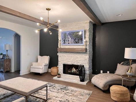 Black Accent Wall With White Stone Fireplace - Soul & Lane Light Stone Fireplace Dark Wall, Black Accent Wall With White Fireplace, Stone Feature Wall Living Room, White Stone Fireplace, Black Accent Wall Living Room, Whitewash Stone Fireplace, Living Room Feature Wall, Room Feature Wall, White Stone Fireplaces