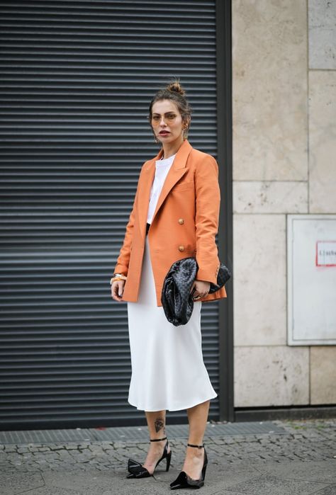 Wear an orange one with a white dress and black heels for the perfect on-the-go look. Blazer And Skirt Outfits, Business Casual Blazer, Orange Blazer, 30 Outfits, Zoe Kravitz, Blazer And Skirt, White And Orange, Leather Pencil Skirt, Oversized Blazer