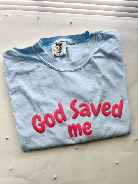 This God Saved Me Christian T-shirt is the perfect addition to your collection of faith-based clothing. Made with a loose fit, short sleeves, and a round neck, this casual tee is ideal for everyday wear during any season. Comfortable: This women's T-shirt is designed to provide maximum comfort and breathability. It's perfect for hot summer days or layering during the colder months. Graphic Design: The graphic design on this T-shirt features the phrase "God Saved Me" in bold letters. It's a great God Saved Me, Faith Tshirts, Christian Tshirt Design, Summer Tee Shirts, Christian Merch, Faith Based Clothing, Graphic Tshirt Design, Christian T Shirt, Jesus Shirts