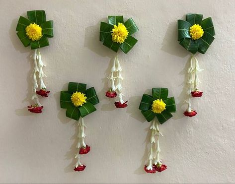 #pooja #flowers #mango #leaf Ashok Leaves Decoration, Simple Flower Decoration At Home, Mango Leaves Decoration Indian, Simple Background Decoration, Mango Leaf Decorations, Pooja Background Decoration, Mango Leaf Toran, Pooja Background, Pooja Photography