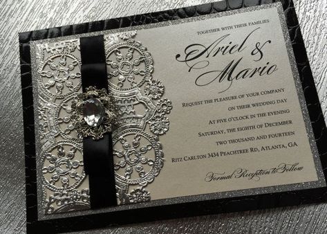 Your invitations should look classy! It’s important to stick to the theme and add a bit of your personality. Black ribbons, lace, and some bling bling or pearls are the perfect combination for your invitations! - See more at: http://www.quinceanera.com/decorations-themes/have-a-black-white-affair-themed-xv/?utm_source=pinterest&utm_medium=social&utm_campaign=article-021916-decorations-themes-have-a-black-white-affair-themed-xv#sthash.DPVYkrwz.dpuf Black And White Centerpieces, Embossed Invitations, Quince Invitations, Silver Centerpiece, Quince Decorations, Quinceanera Themes, Birthday Party For Teens, Black Invitation, Future Wedding Plans