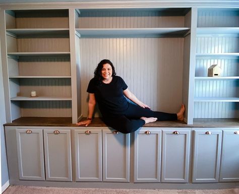 Light blue bookshelves custom made by a woman. Beadboard Built Ins, Bookshelf With Beadboard Back, Beadboard Bookshelf, Beadboard Bookcase, Sw Stardew, Diy Built In, Bead Board Walls, Bookshelf Cabinet, Diy Wood Shelves