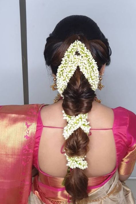 Introducing latest Bridal Hairstyles for South Indian Brides. #weddingbazaar #indianwedding #bridalhairstyle #southindianweddings #southindianbride #southindianhairstyleforsaree #southindianhairstylesimple #southindianhairstylebridal #southindianhairstyletraditional #southindianhairstylelehenga Front Hair Styles For Brides Indian, Muhurtham Jadai Front Hairstyle, Saree Hairstyles With Jasmine, Hairstyle For Engagement Bride In Saree, Hairstyles For Traditional Saree, Braided Hairstyles For Saree, Hair Styles For Marriage, Muhurtam Hairstyles, Hairstyles For South Indian Wedding