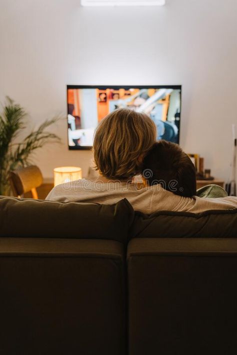 Young gay couple hugging and resting on couch while watching tv royalty free stock images Couple Hugging On Couch, Couple In Couch, Couple Watching Movie On Couch, Couple Watching Tv Aesthetic, Couple On A Couch, Couple On Sofa, Couple Watching Tv, Christian Relationship, Couple Hugging