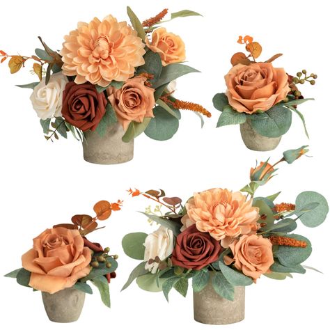 PRICES MAY VARY. Package: Set of 4 pre-made flower centerpieces. Arrangements come with vases and 2pcs place cardholders. Size: the large centerpiece is approx. 7.5" wide by 7" high, and the small one is approx. 3.5" wide by 4" high. Material: The centerpiece is a merge of delicate foam/silk flowers, filler flowers, and interesting greenery, with natural shapes and a variety of textures. Dahlia, vendela rose, and avalanche rose accent the centerpiece for a soft and romantic feel. Earth paper vas Terra Cotta Wedding Centerpieces, Mexican Wedding Centerpieces, Cheap Table Decorations, Flower Pot Centerpiece, Vase Wedding Decor, Flowers With Vase, Fall Floral Centerpieces, Desk Flowers, Centerpiece Flower