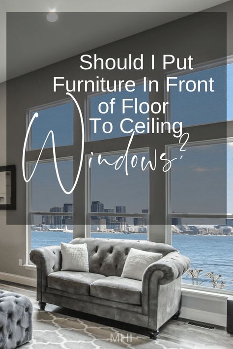 I’ve learned, sometimes the best place for furniture is in front of a window.  And I think that this might be even more imperative when you have floor to ceiling windows, especially if they go around the space.  To help you decide, here are 5 key points to consider when deciding, “Should I put furniture in front of floor to ceiling windows? Picture Window Furniture Layout, Sofa In Front Of Large Window, Furniture Placement In Front Of Windows, Placing Furniture In Front Of Windows, Couch In Front Of French Doors, Floor Windows Living Room, Living Room With Floor To Ceiling Window, Full Wall Windows Living Rooms, Picture Window Ideas Living Room