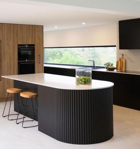 Imperial. Kitchens by Design on Instagram: "A curved island bench has been all the craze lately! We are thrilled to see this kitchen come to life 🖤 Doors: @bonlexaustralia ~ Black Satin Flat Profile Feature Island: @porta_timber ~ Black Curved Contour Benchtop: @stoneambassadoraus ~ Statuario Signature #imperialkitchens #kitchenrenovation #kitchens #kitchendesign #interiordesign #homedecor #interiors #kitchensofinstagram #home #kitchenideas #kitcheninspiration #kitchenisland #kitchengoals #re Timber Look Kitchen, Black Island Bench, Fluted Curved Kitchen Island, Feature Kitchen Island, Feature Island Kitchen, Black Fluted Kitchen Island, Black Fluted Island, Fluted Island Bench, Curved Kitchen Benchtop