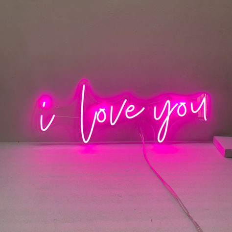 Introducing our Handcrafted LED Neon Sign - I love you Neon Light! This neon sign decor is perfect for adding a vibrant touch to your bedroom, children's room, studio, or office desk. Let's explore some key features and information about this product: 🌈 Materials and Info: ● Acrylic board color: Clear ● Acrylic board shape: Cut to shape ● Power supply: Suitable plug + adapter for your country ● Installation options: Mounting screws (default), Hanging wires, 2M strips, Stand ● Accessories: Dimmer to control lights on/off 🎨 Color Options: Choose from a variety of 13 colors to suit your preference: ❶Cold White,❷White,❸Warm White,❹Ice Blue,❺Blue,❻Lemon Yellow,❼Yellow,❽Orange,❾Red,❿Green,⓫Light Pink,⓬Pink,⓭Purple 📐 Easy Installation: Hanging your neon sign is super easy and doesn't require a Neon Sign Wedding Backdrop, Wedding Backdrop Ideas, Sign For Bedroom, I Love You Signs, Room Studio, Backdrop Ideas, Let It Shine, Acrylic Board, Love Sign