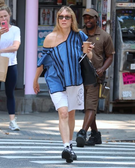 Chloë Sevigny’s Heatwave Uniform Is Art School Meets Jock Celeb Paparazzi, Chloe Sevigny Style, Chloë Sevigny, Blue Slip Dress, Transitional Fashion, Khaki Coat, Fashion Trend Forecast, Chloe Sevigny, Paparazzi Photos