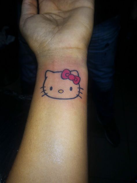 Hello kitty Hello Kitty Wrist Tattoo, Wrist Tatoo, Evil Tattoo, Wrist Tattoos, Print Tattoos, Infinity Tattoo, Paw Print Tattoo, Paw Print, Tatting