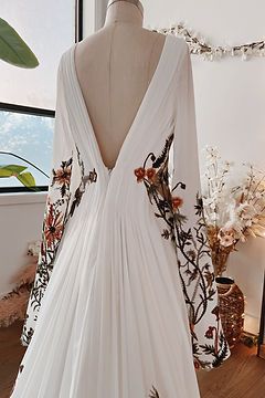 Unique & Non-Traditional Wedding Dresses | Flora & Lane Bohemian Floral Wedding Dress, Embroidered Wedding Dress With Sleeves, White Dress Embroidered Flowers, Flower Embroidered Wedding Veil, Traditional Polish Wedding Dress, Boho Floral Wedding Dress, Wedding Dress With Floral Embroidery, Wedding Dresses With Flowers Detail, Wedding Dress Floral Embroidery